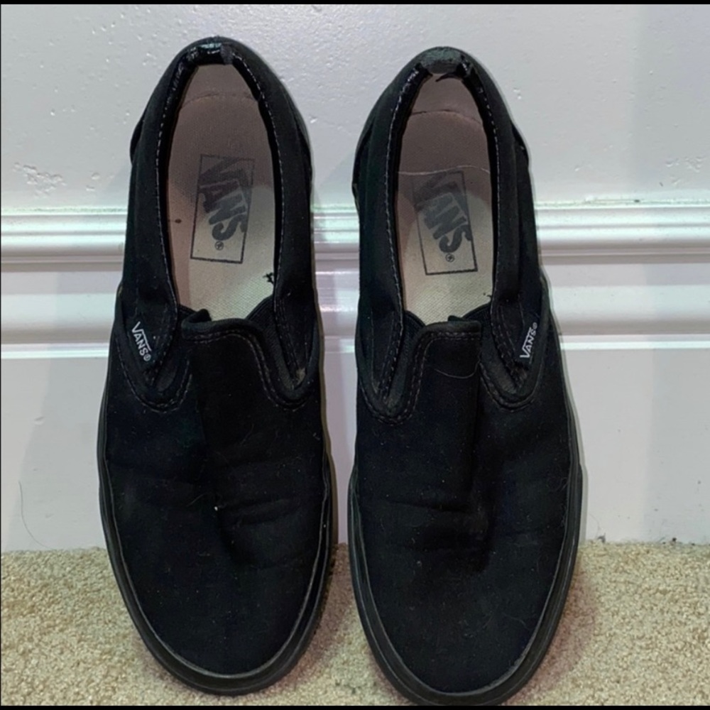 Solid black vans